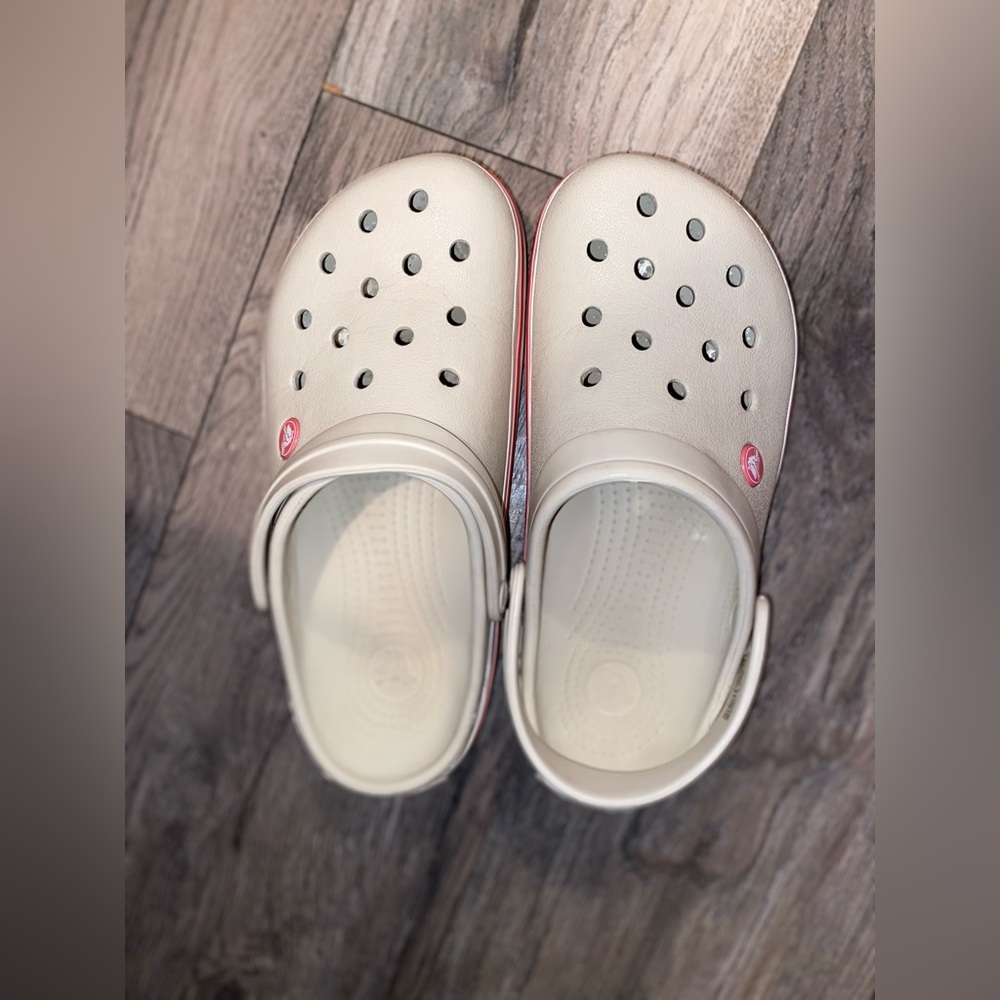 Creme color with pink crocs
